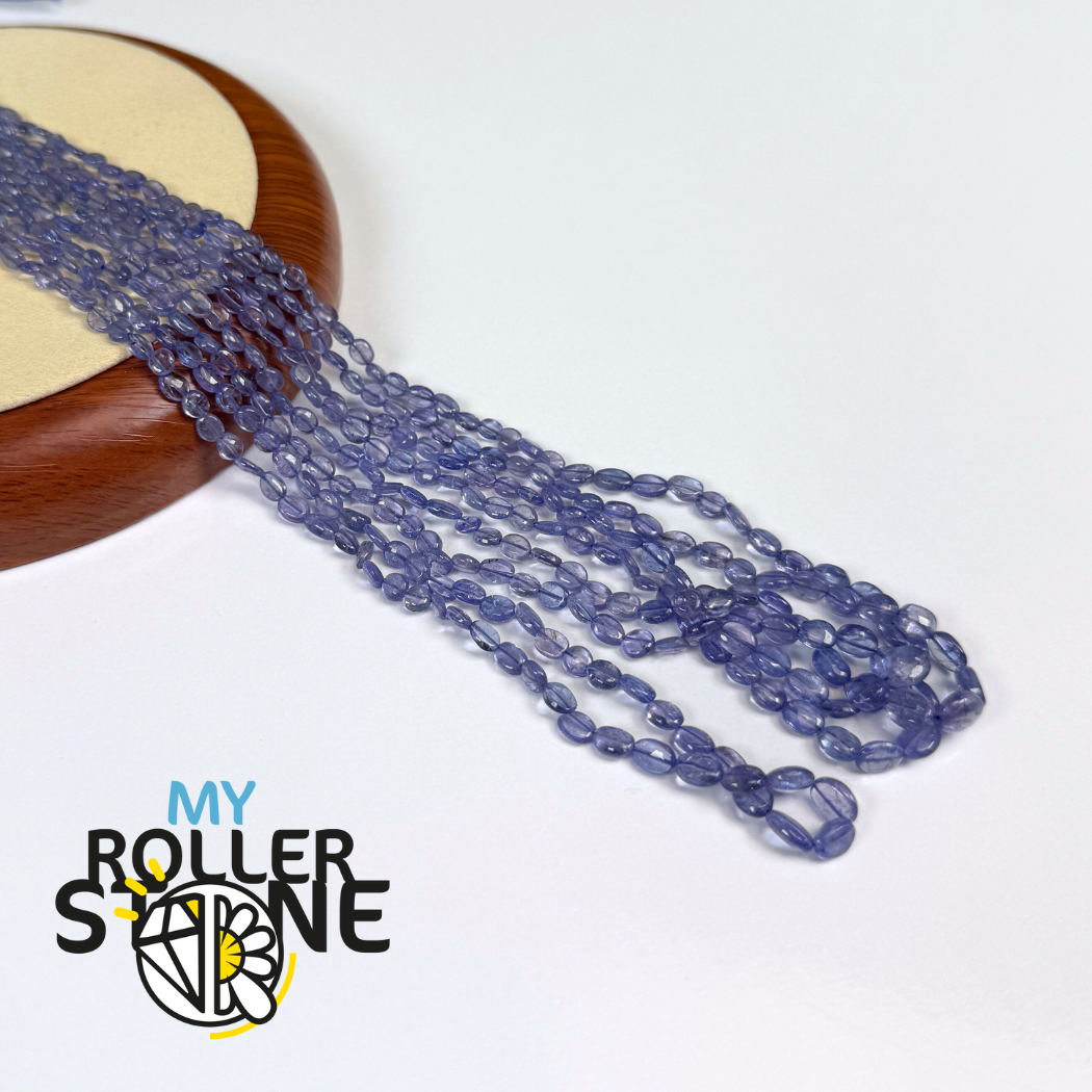 Perles de Tanzanite lisses – forme ovale -3,9 × 4,5 mm