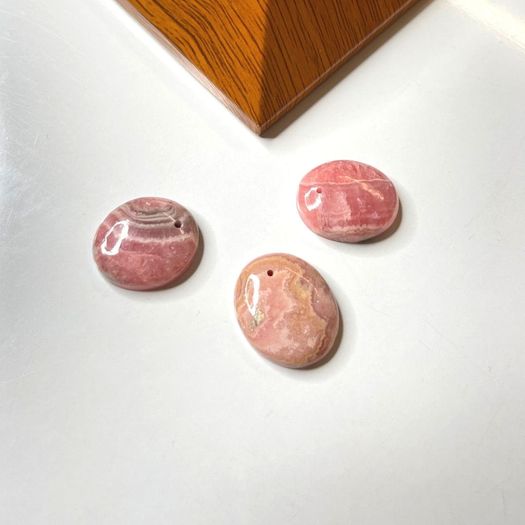 Pendentif Rhodochrosite AA - Ovale / À l’unité