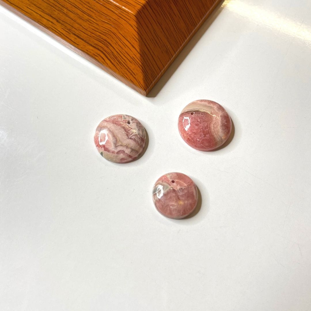 Pendentif Rhodochrosite AA - Ronde / À l’unité