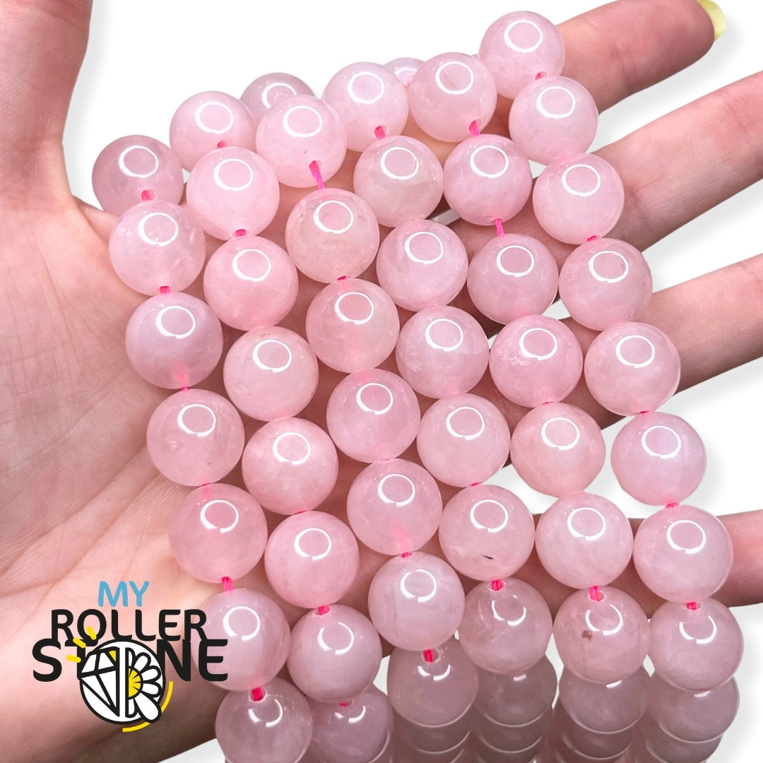 Grandes perles rondes en quartz rose du Brésil