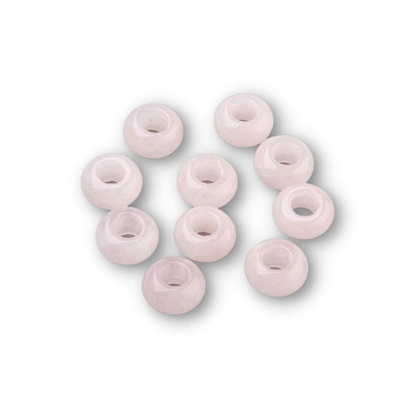 Perles en quartz rose à grand trou