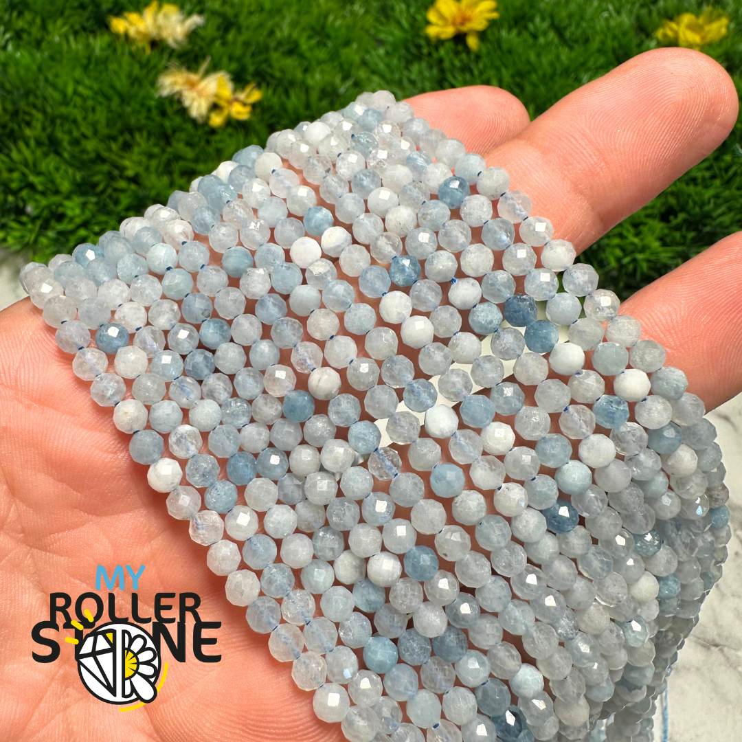 Perle ronde facettée Aigue-marine