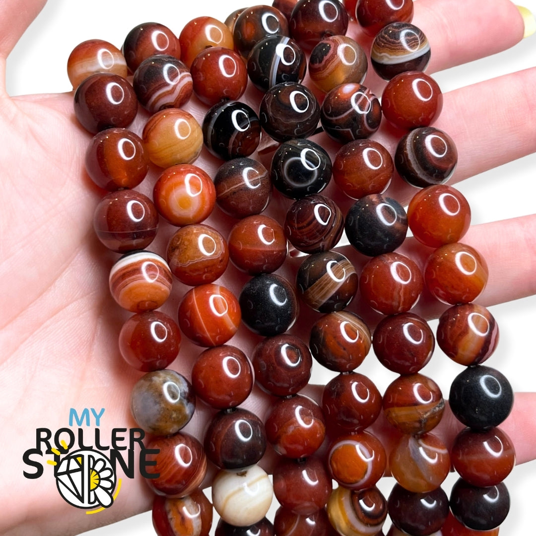 Reconnaître une vraie Sardonyx : bandes naturelles, couleurs, polissage et vendeur sérieux.