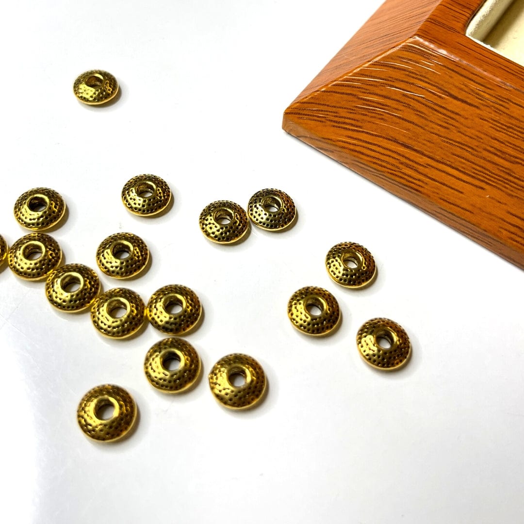 Perles d'espacement plates rondes style tibétain