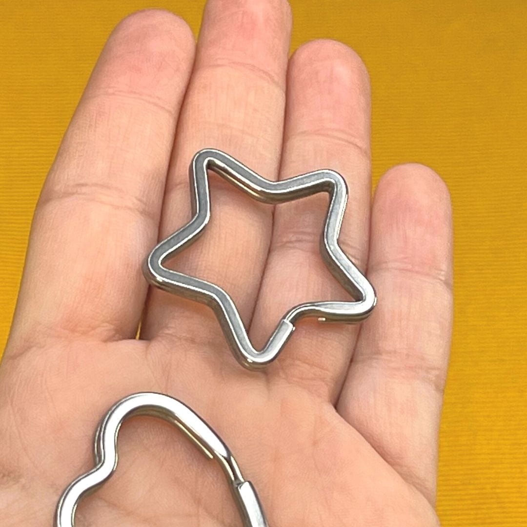 Porte clef Étoile acier inoxydable