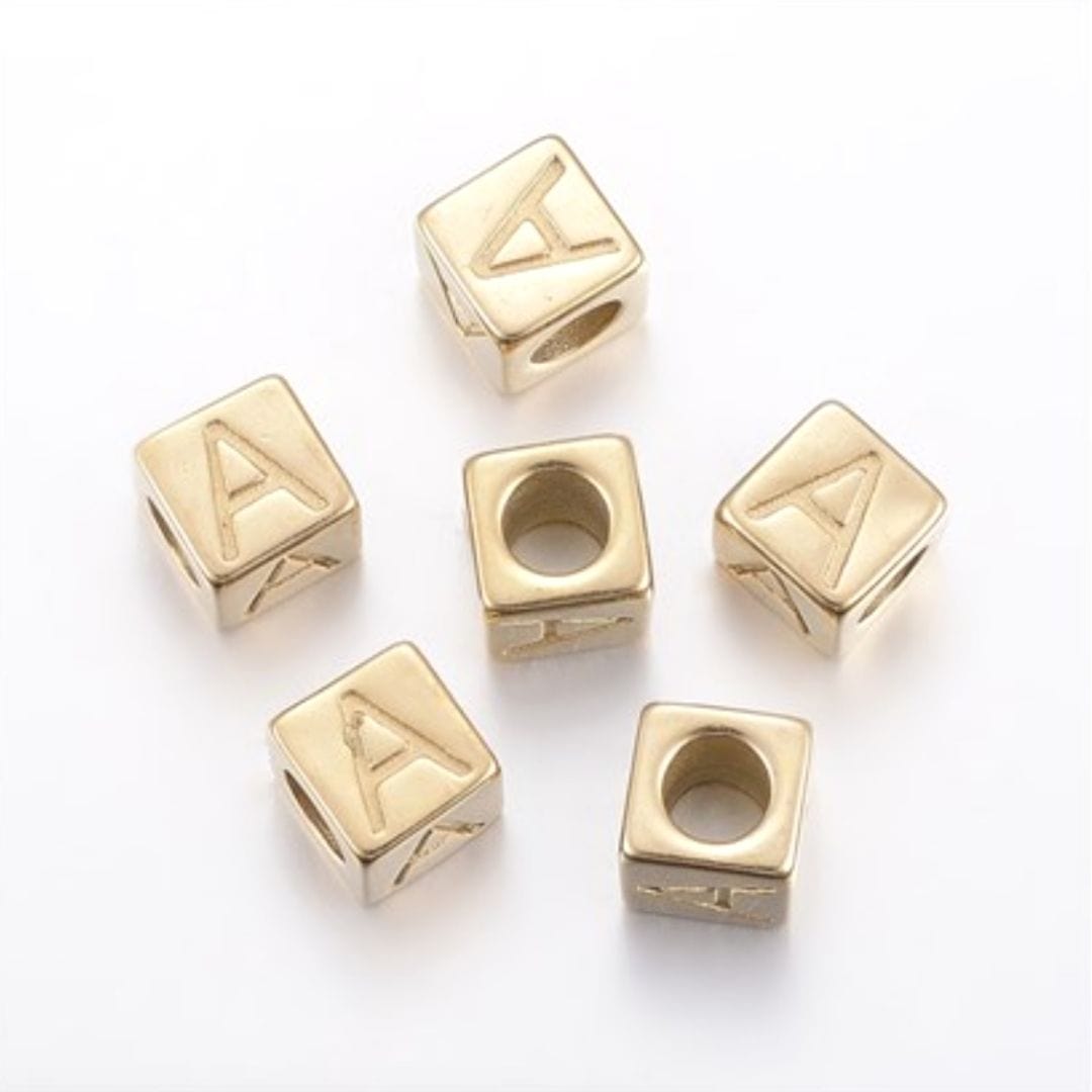 Perles alphabet doré